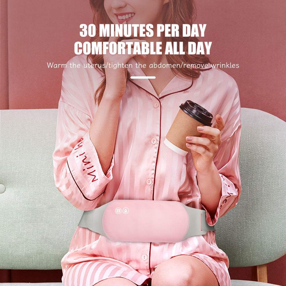Electric heated hot compress belt massager for menstrual pain relief in pink Lycra fabric.