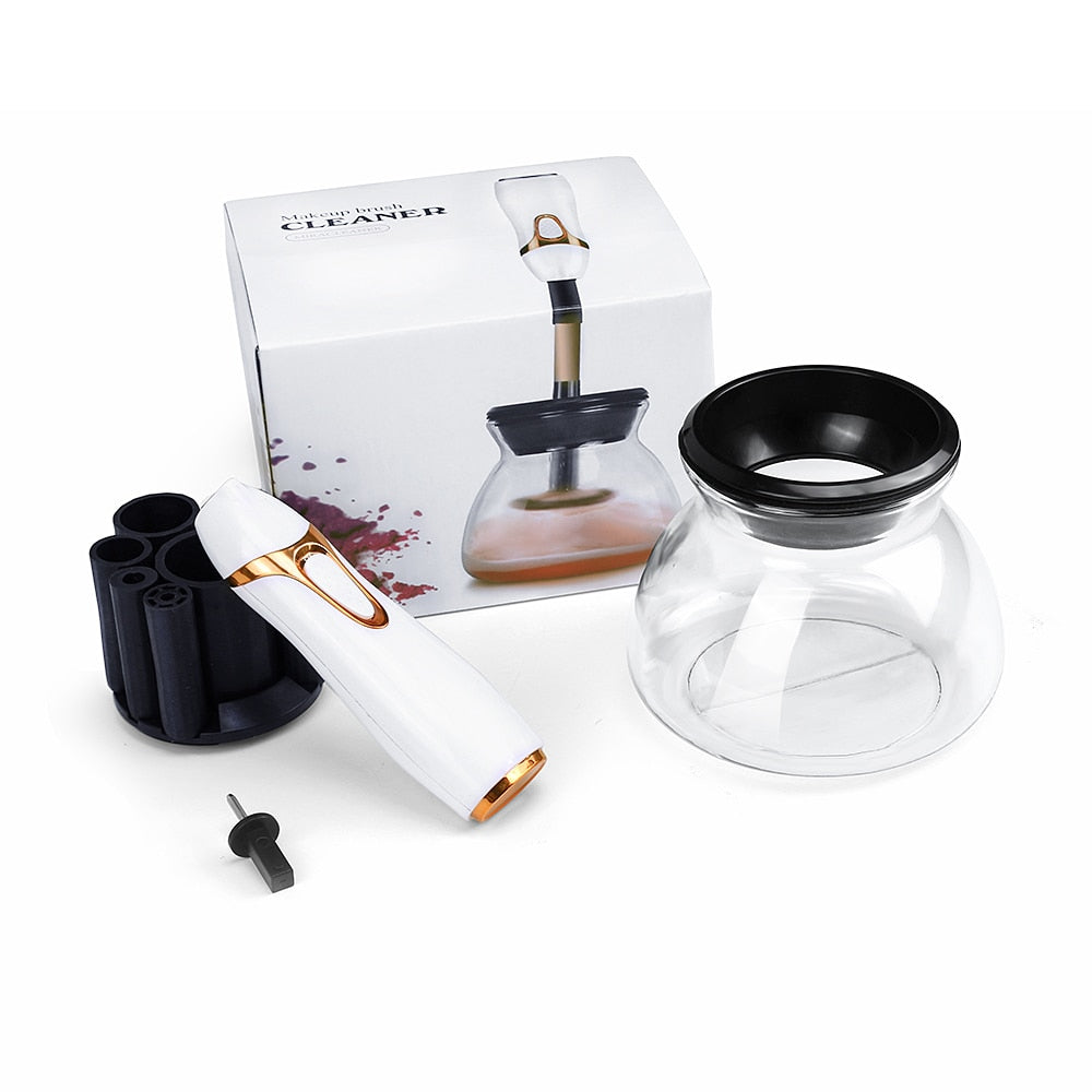 Automatic makeup brush cleaner and dryer with silicone cleaning tool.